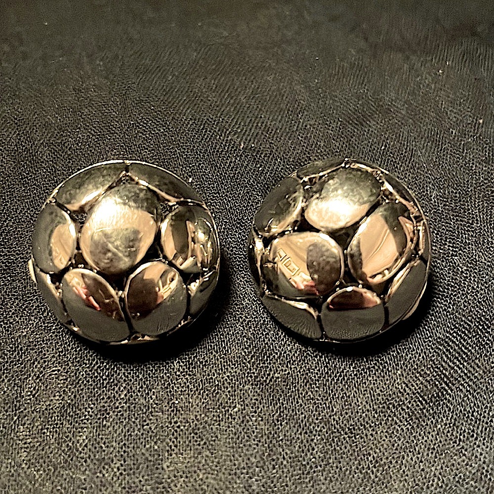 Round vintage, silver toned clip on earrings with padding. DISCOUNT in listing!